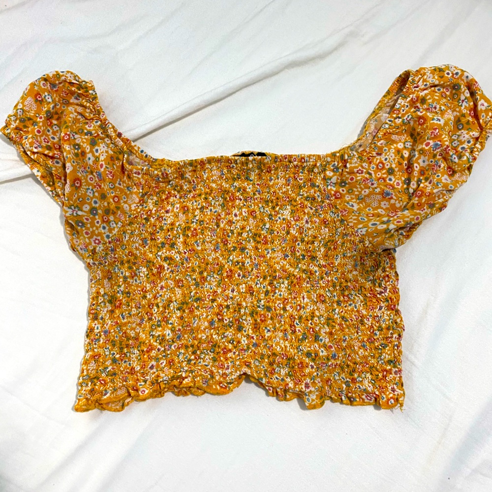 Bright yellow floral summer crop top with cinching